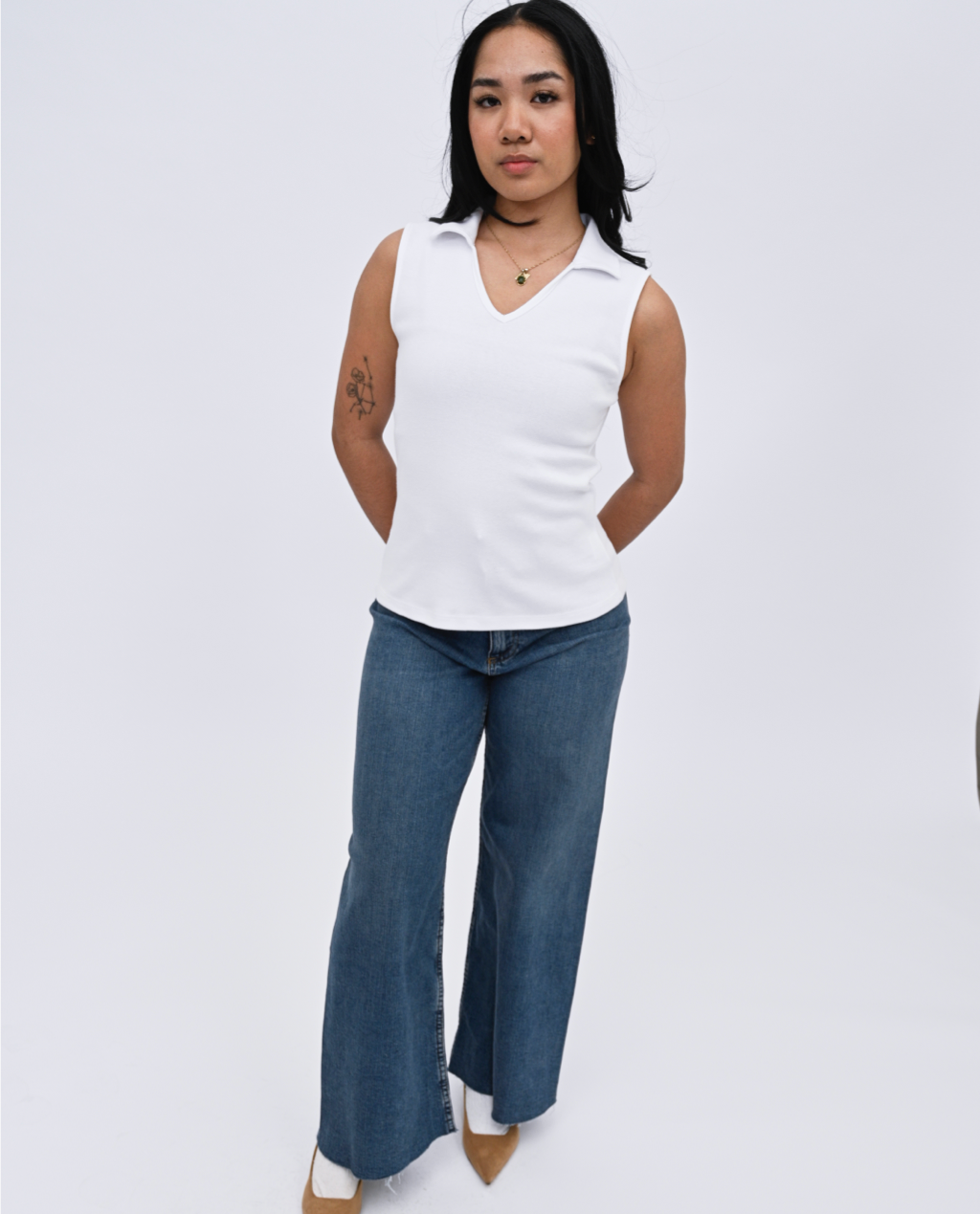 Sita sleeveless polo Top